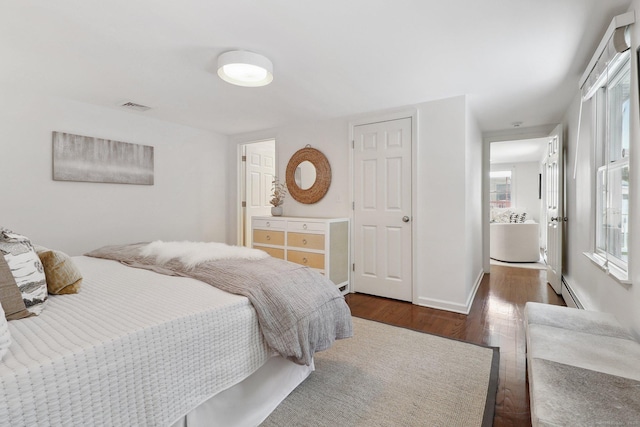 23 Poplar St, Norwalk, CT 06855 - bedroom featuring dark wood-style floors and baseboards
