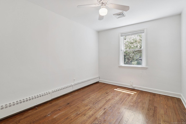 23 Poplar St, Norwalk, CT 06855 - spare room with a baseboard heating unit, wood finished floors, baseboards, and a ceiling fan
