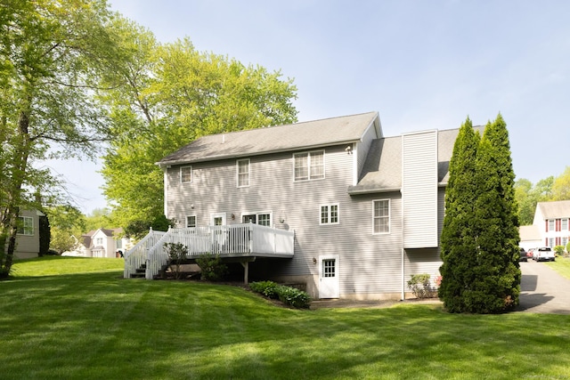 191 Pond View Dr, Watertown, CT 06795 - back of property with a yard and a wooden deck