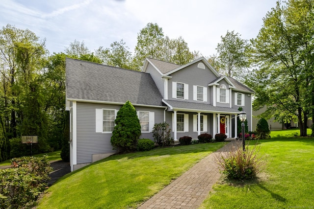 191 Pond View Dr, Watertown, CT 06795 - view of front of home featuring covered porch, a front yard, and a shingled roof