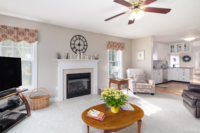 191 Pond View Dr, Watertown, CT 06795 - living room with light colored carpet, a fireplace, and ceiling fan
