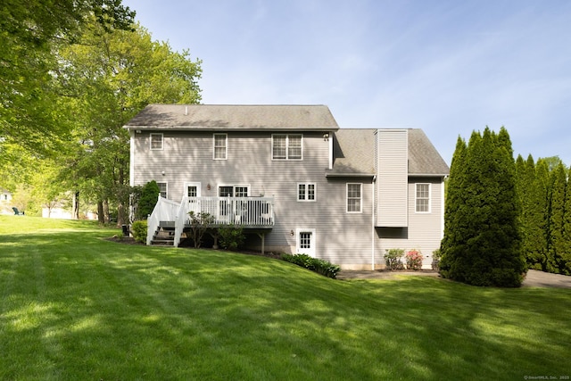 191 Pond View Dr, Watertown, CT 06795 - rear view of property with a lawn, a deck, a chimney, and roof with shingles