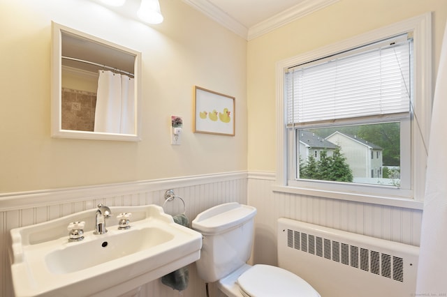 94 Mulberry St, Stamford, CT 06907 - bathroom featuring radiator, a wainscoted wall, ornamental molding, and curtained shower
