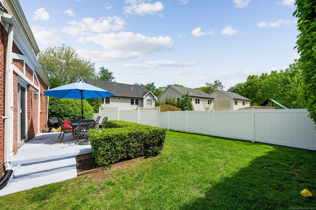 94 Mulberry St, Stamford, CT 06907 - fenced backyard featuring a patio area and a residential view