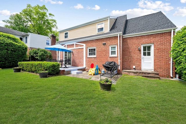 94 Mulberry St, Stamford, CT 06907 - back of house with a patio, brick siding, and a yard
