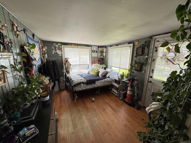 bedroom featuring hardwood / wood-style floors