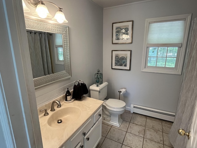 27 Regency Dr, North Haven, CT 06473 - bathroom with a baseboard radiator, vanity, toilet, tile patterned floors, and a shower with shower curtain