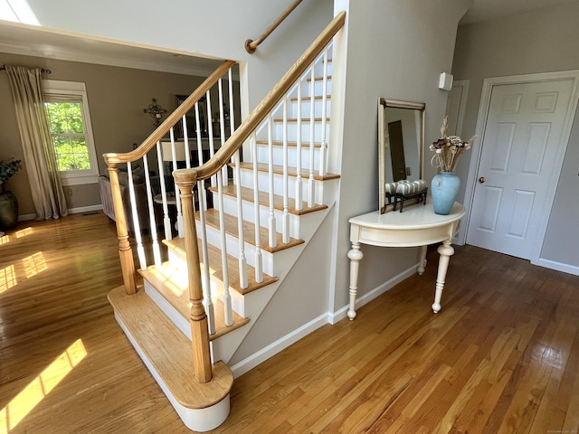 27 Regency Dr, North Haven, CT 06473 - stairway with wood finished floors and baseboards