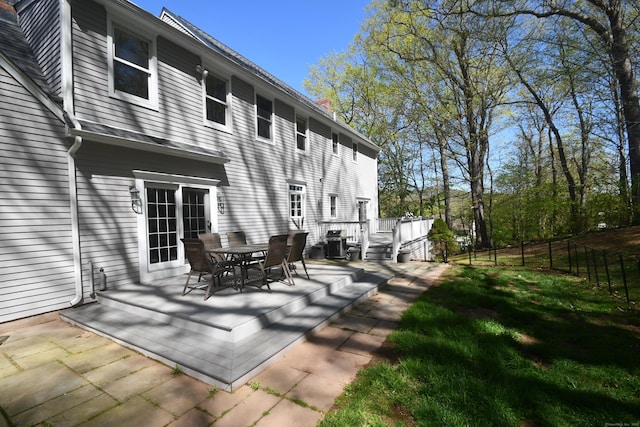 27 Regency Dr, North Haven, CT 06473 - view of patio with a deck and outdoor dining area