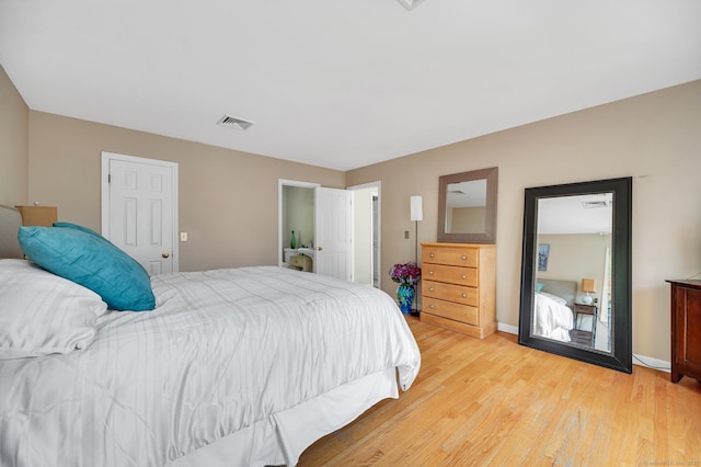 27 Regency Dr, North Haven, CT 06473 - bedroom with light wood-style floors and baseboards