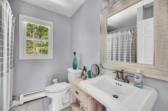 27 Regency Dr, North Haven, CT 06473 - bathroom featuring baseboard heating, toilet, tile patterned floors, baseboards, and vanity