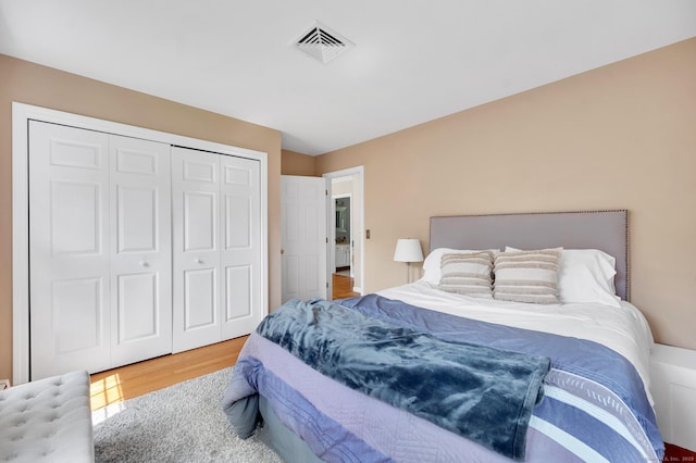 27 Regency Dr, North Haven, CT 06473 - bedroom with wood finished floors and a closet