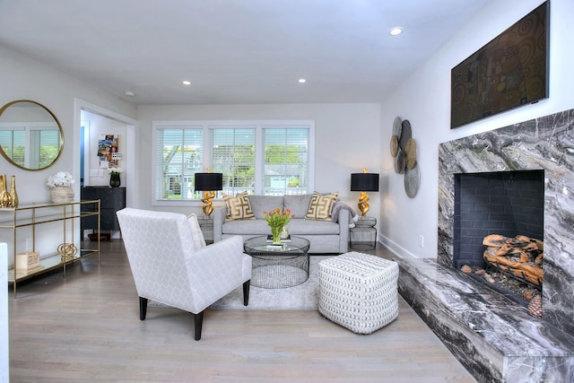 38 Tamarac Rd, Westport, CT 06880 - living room with wood finished floors, a high end fireplace, recessed lighting, and baseboards
