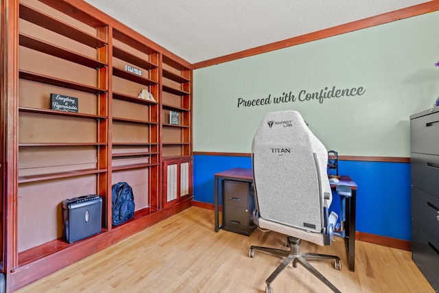 11 Osprey Ln, East Lyme, CT 06357 - office area featuring wood finished floors and a textured ceiling
