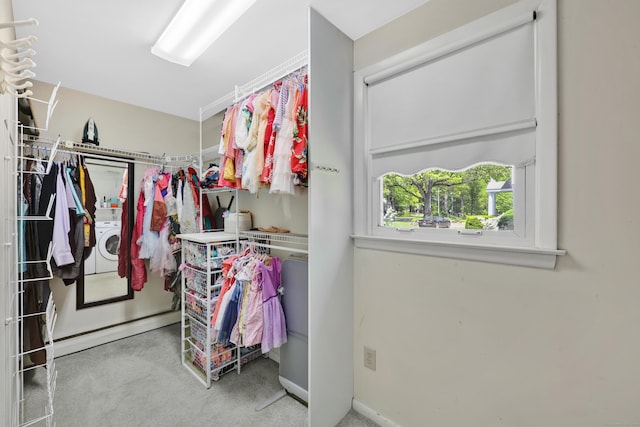 walk in closet featuring carpet