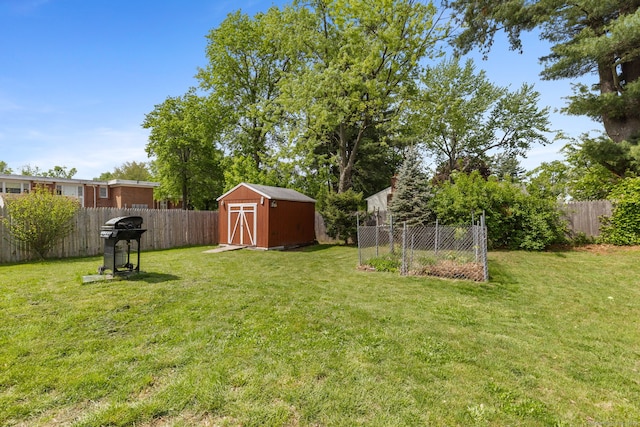 31 Scott St, East Hartford, CT 06118 - view of yard featuring a storage unit and an outdoor structure