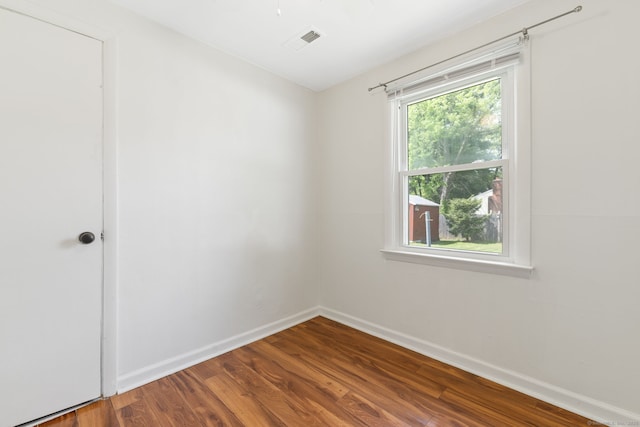 31 Scott St, East Hartford, CT 06118 - spare room featuring wood finished floors and baseboards