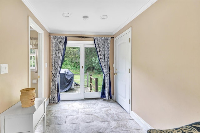 doorway to outside featuring ornamental molding and baseboards