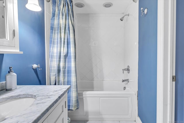 bathroom featuring shower / tub combo with curtain and vanity