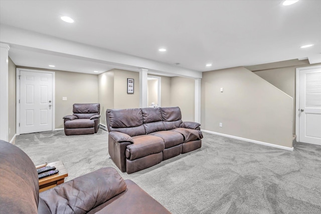 carpeted living room featuring recessed lighting and baseboards