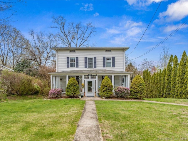 571 Pond Point Ave, Milford, CT 06460 - traditional-style home with a front lawn