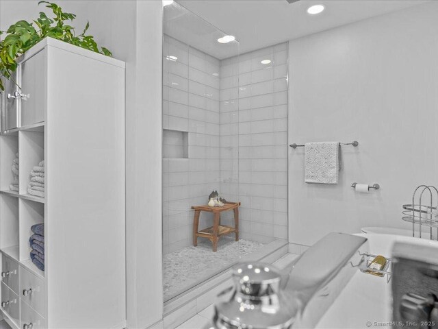 571 Pond Point Ave, Milford, CT 06460 - bathroom with tiled shower and recessed lighting