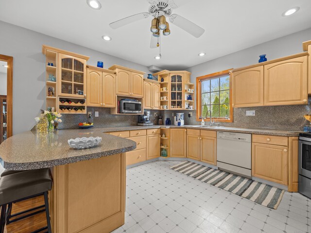 571 Pond Point Ave, Milford, CT 06460 - kitchen featuring open shelves, stainless steel appliances, light brown cabinetry, a sink, and recessed lighting