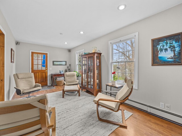 571 Pond Point Ave, Milford, CT 06460 - living area with wood finished floors and recessed lighting