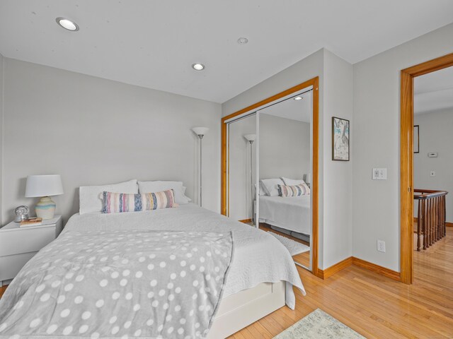571 Pond Point Ave, Milford, CT 06460 - bedroom featuring wood finished floors, baseboards, a closet, and recessed lighting