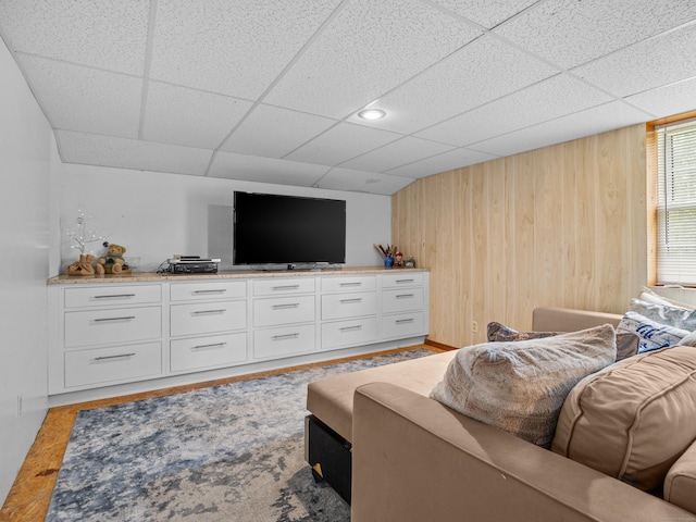 571 Pond Point Ave, Milford, CT 06460 - living area with wood walls and a paneled ceiling