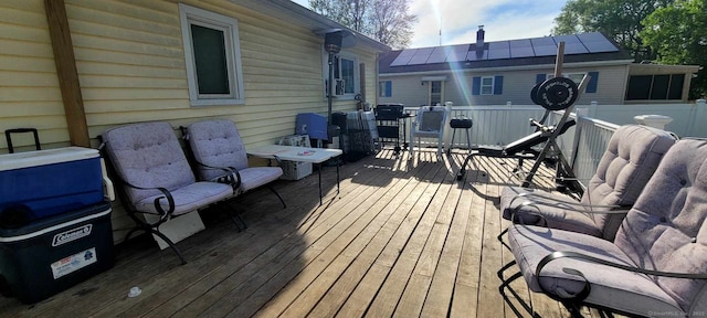 deck featuring outdoor dining space