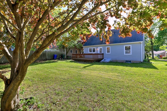 view of yard with a deck