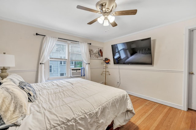 592 Courtland Ave, Bridgeport, CT 06605 - bedroom featuring crown molding, wood finished floors, baseboards, cooling unit, and ceiling fan