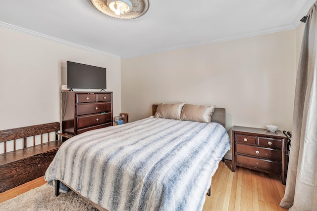 592 Courtland Ave, Bridgeport, CT 06605 - bedroom featuring ornamental molding and light wood-style flooring