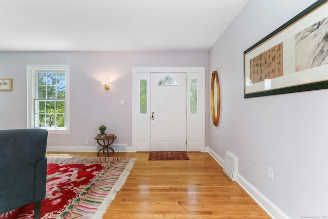 24 Richards Ln, Norwalk, CT 06851 - entryway with light wood-type flooring and baseboards