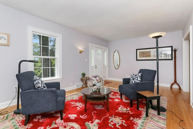 24 Richards Ln, Norwalk, CT 06851 - living room featuring light wood-style floors and baseboards