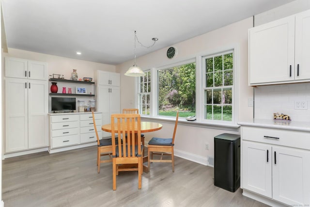 24 Richards Ln, Norwalk, CT 06851 - dining area featuring light wood finished floors, baseboards, and recessed lighting