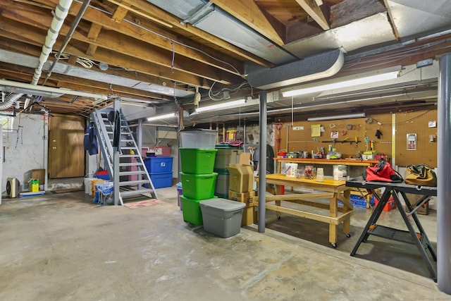 24 Richards Ln, Norwalk, CT 06851 - unfinished basement with a workshop area