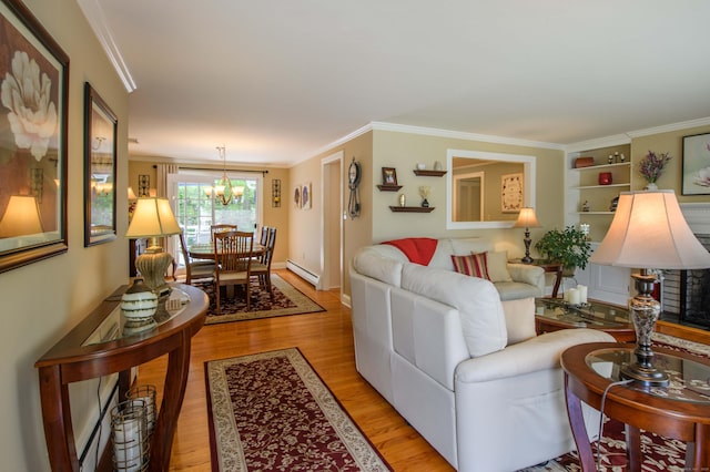 121 Dinatali Dr, Waterbury, CT 06705 - living room featuring a baseboard radiator, light wood-style flooring, a chandelier, ornamental molding, and built in features