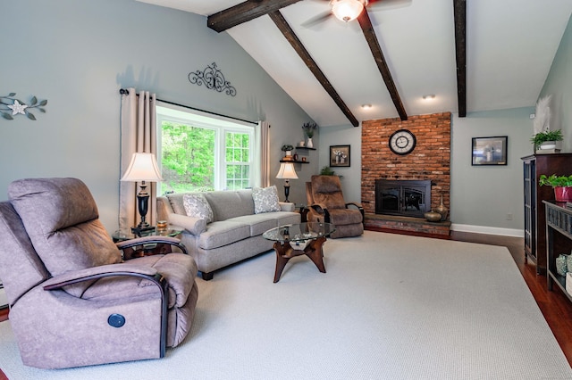 121 Dinatali Dr, Waterbury, CT 06705 - living room with a fireplace, ceiling fan, dark wood finished floors, and baseboards