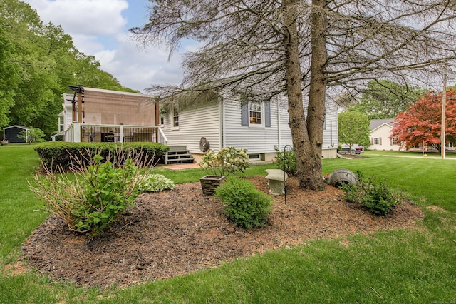 121 Dinatali Dr, Waterbury, CT 06705 - view of grassy yard with a wooden deck