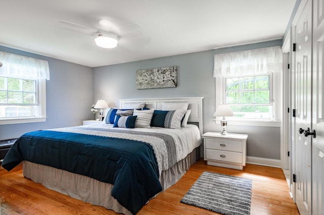 121 Dinatali Dr, Waterbury, CT 06705 - bedroom with light wood-style flooring, baseboards, and ceiling fan