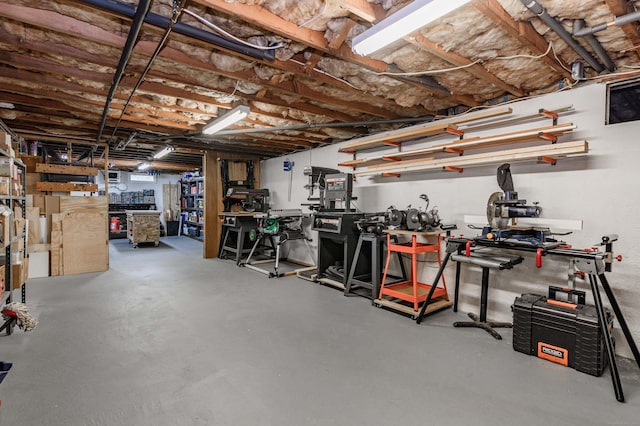 121 Dinatali Dr, Waterbury, CT 06705 - unfinished basement with a workshop area