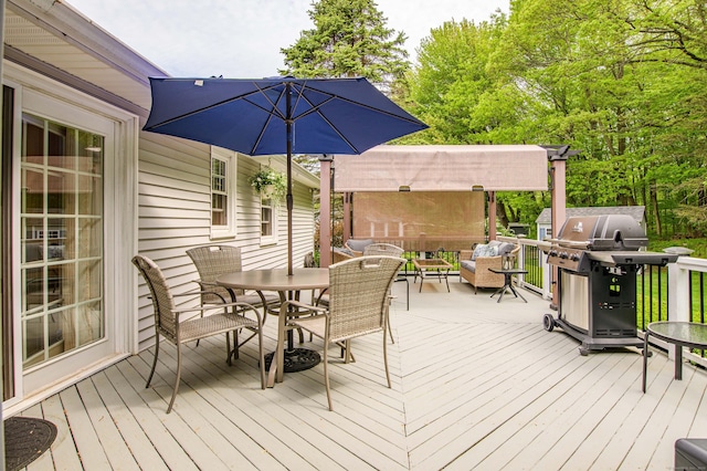 121 Dinatali Dr, Waterbury, CT 06705 - wooden deck with outdoor dining space and a grill