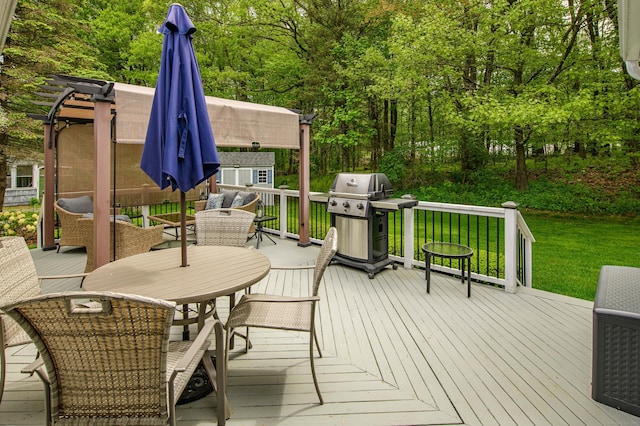 121 Dinatali Dr, Waterbury, CT 06705 - wooden deck featuring a grill, outdoor dining area, a lawn, and an outdoor structure