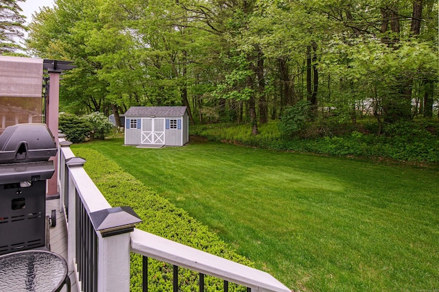 121 Dinatali Dr, Waterbury, CT 06705 - view of grassy yard featuring a shed and an outdoor structure
