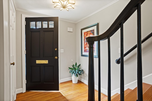 76 Glenbrook Rd, West Hartford, CT 06107 - entrance foyer with wood finished floors and crown molding