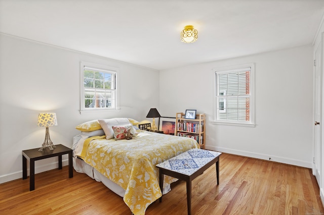 76 Glenbrook Rd, West Hartford, CT 06107 - bedroom with light wood-type flooring and baseboards