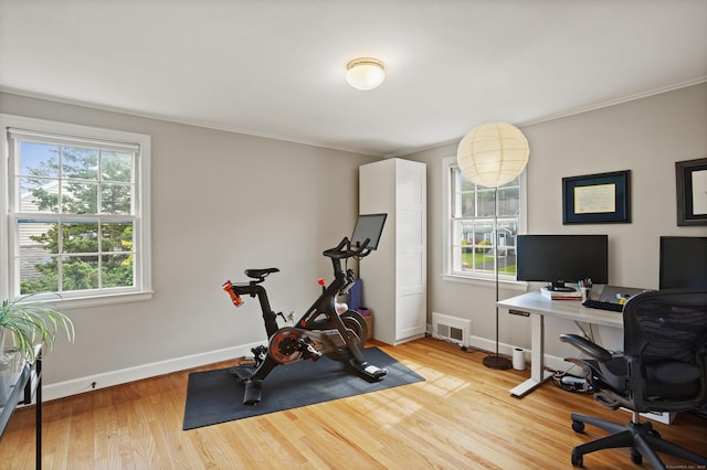 76 Glenbrook Rd, West Hartford, CT 06107 - workout area with wood finished floors and crown molding
