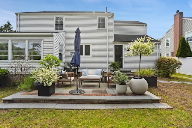76 Glenbrook Rd, West Hartford, CT 06107 - rear view of property with an outdoor hangout area and a patio